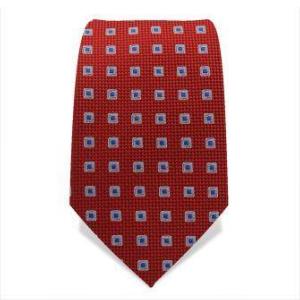 Cravate rouge à pois bleus